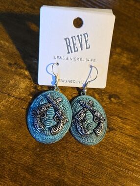 Turquoise Carved Oval Dangle Earrings
